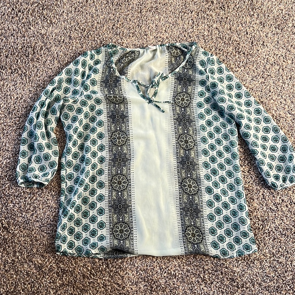 Nice teal colored sheer top small